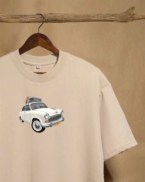 Close-up of beige oversized unisex T-shirt from Printrove featuring a front design, made from 240GSM fabric.