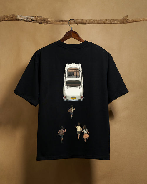 Black unisex oversized T-shirt by Printrove with "Ambassador" printed on the back, made from 240GSM fabric.