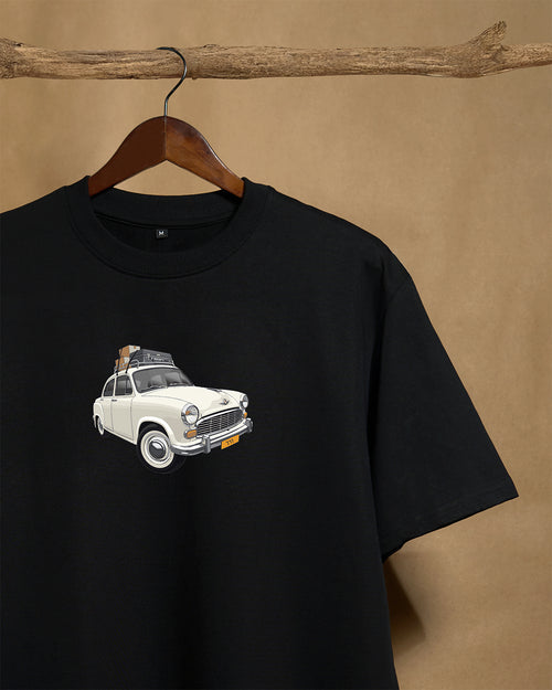 Close-up of Printrove Ambassador Black unisex oversized T-shirt showing front design and 240GSM fabric texture.
