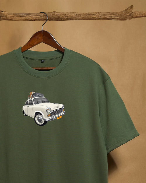 Close-up of a forest green unisex oversized T-shirt by Printrove, showing the front view and fabric texture.
